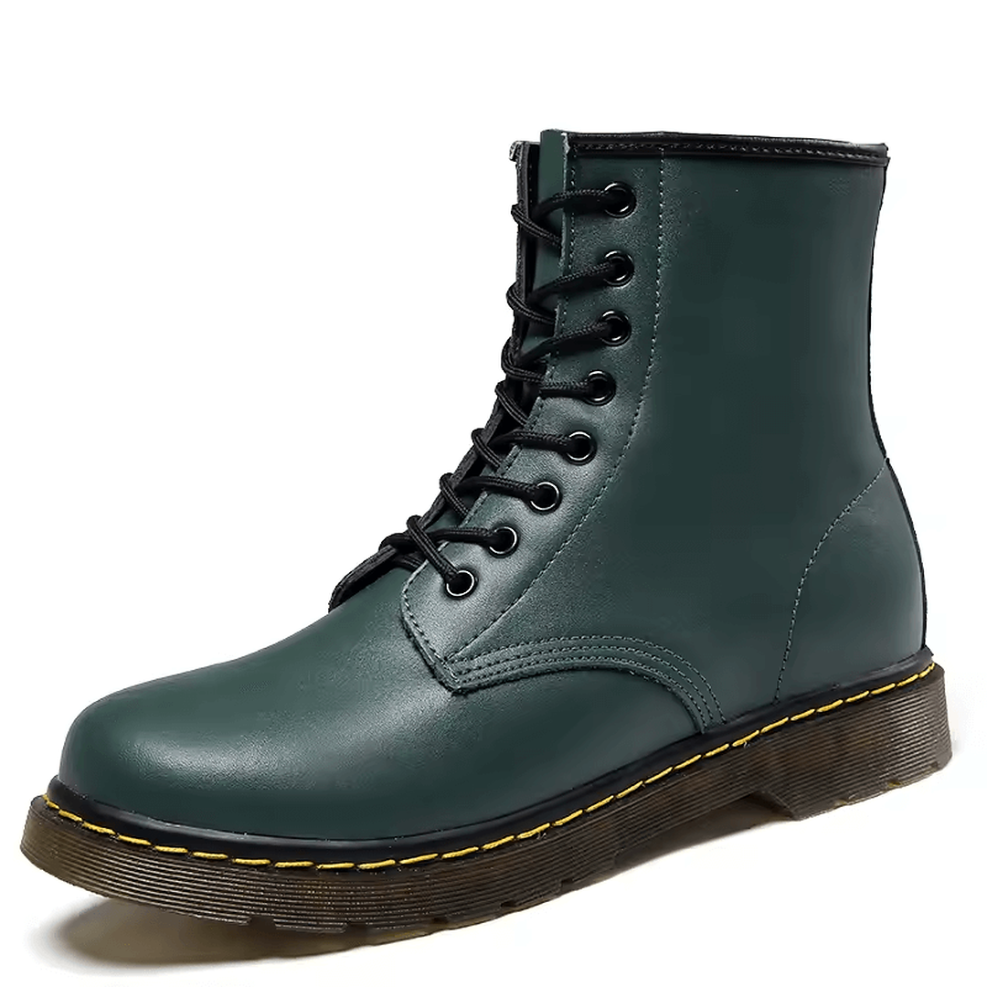Botines hombre estilo Londres en color verde oscuro con diseño clásico y cordones negros.